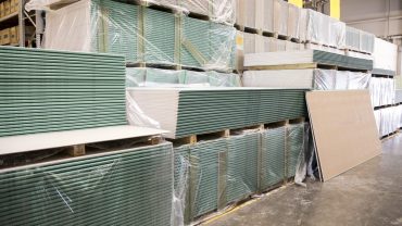 Large furniture warehouse of industial store. Warehouse of building materials shop